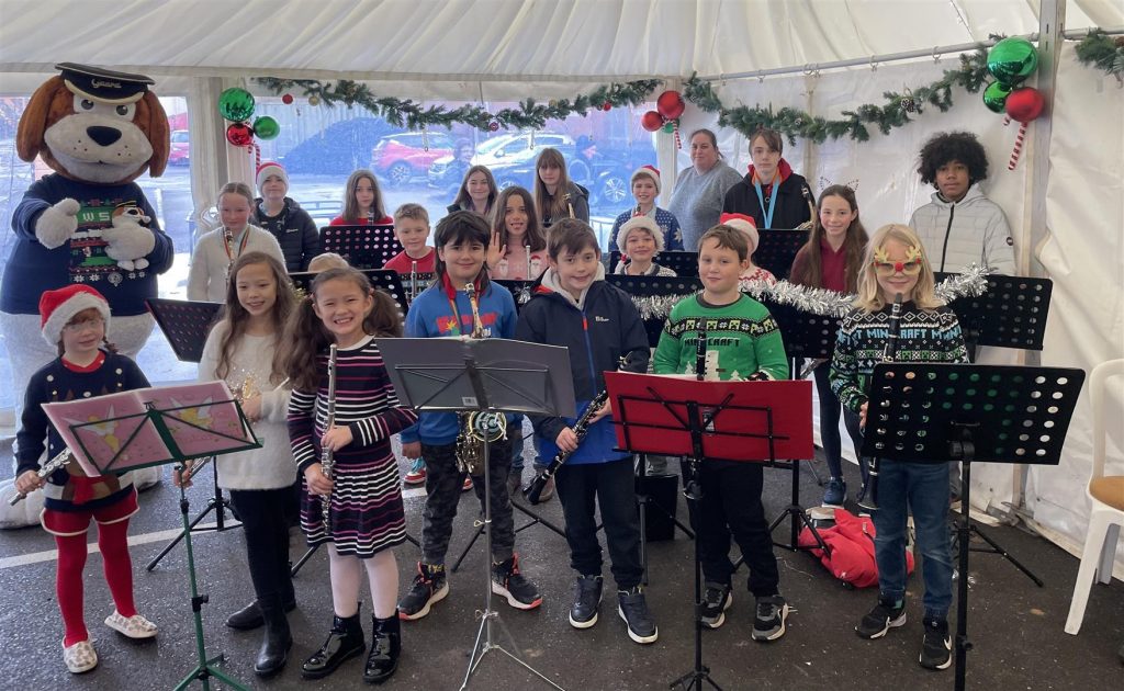 A group of children with instruments.